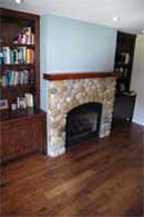 Custom cabinetry and plank floors